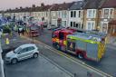 A 60-year-old man was arrested on suspicion of drink driving after a vehicle collided with parked cars and a home.