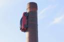 Londoners have been left shocked after they spotted a car had been parked on the side of the Truman Brewery chimney in Brick Lane, Shoreditch.