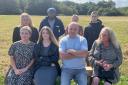 The family of Max Moy-Wheatley, who was stabbed to death in Petts Wood, pictured on his memorial bench in Jubilee Park