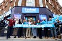 Mayor of Camden, Councillor Samata Khatoon cuts the ribbon with Leyland CEO Martin Hastings and other members of the Leyland team