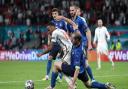 Italy's Giorgio Chiellini (right) tackles England's Raheem Sterling during the UEFA Euro 2020 Final at Wembley Stadium, London. Picture date: Sunday July 11, 2021.