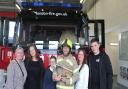 Wayne Crossman (centre) was accompanied by his family as he retired from the fire service