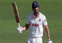 Sir Alastair Cook of Essex celebrates scoring a century against Yorkshire