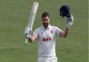 Matt Critchley of Essex celebrates scoring a maiden debut century against Kent