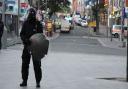 Riot police in Barking town centre after it was cleared of rioters in August 2011.