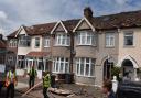 Council workers clearing debris in Wilmington Gardens, Barking, on Saturday following Friday's 