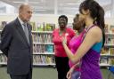 Prince Philip talks to residents who took part in a Pilates demonstration at Chadwell Heath Community Centre, which was the first stop on a tour of the borough to mark its 50th anniversary.