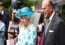 Queen Elizabeth II and the Duke of Edinburgh arrive for their visit to Broadway Theatre in Barking. Picture: PA