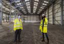 Cllr Darren Rodwell with Lisa Dee, head of Film LBBD inside one of the warehouses at The Wharf in Barking.