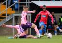 Josh Walker in action against Yeovil Town in his last appearance for Dagenham & Redbridge