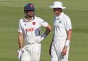 Sir Alastair Cook and Stuart Broad chat during the match between Essex and Nottinghamshire