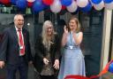 Cllr Maureen Worby cuts the ribbon to open the community hub with Cllr Tony Ramsay (Ieft) and college principal Natalie Davison