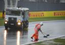 Heavy rain caused qualifying to be postponed (Andre Penner/AP)