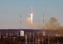 In this photo released by Roscosmos, a Soyuz rocket lifts off from a launch site in Vostochny, far eastern Russia, to carry satellites, including two built by Iran, into orbit on Tuesday (Ivan Timoshenko/Roscosmos/AP)