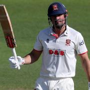 Sir Alastair Cook of Essex celebrates scoring a century against Yorkshire