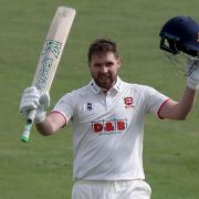 Matt Critchley of Essex celebrates scoring a maiden debut century against Kent