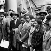 Newham is celebrating Black History Month with a series of free events. Photo shows Jamaican immigrants welcomed by RAF officials from the Colonial Office after the ex-troopship HMT Empire Windrush arrived at Tilbury in 1948.