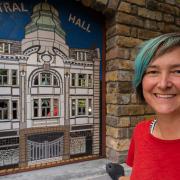 Artist Tamara Froud with her artwork at Short Blue Place, Barking.