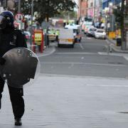 Riot police in Barking town centre the morning after