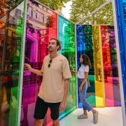 Visitors taking in one of the Summer Lights installations at Canary Wharf.