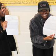 Precious Imoh and Faith Francis after collecting their GCSE results.