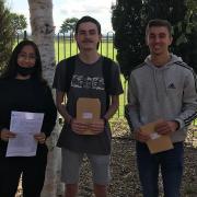 The Warren School pupils Rukhsar Bhola, Zac Davis and Bradley Deacon with their results.