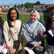 Nazmin Begum, Humayra Ali, Thaniya Akhtar and Zainab Alaran at Eastbrook School after collecting their results.