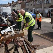 Council workers clearing debris in Wilmington Gardens following the Barking tornado