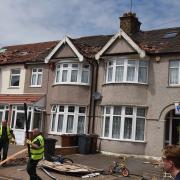 Council workers clearing debris in Wilmington Gardens, Barking, on Saturday following Friday's 