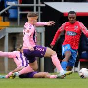 Josh Walker in action against Yeovil Town in his last appearance for Dagenham & Redbridge