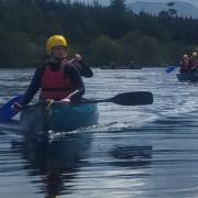 Students canoeing on the River Wye