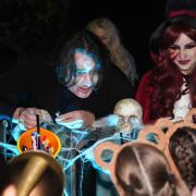 Jonathan Ross outside his house in north London with trick-or-treaters (James Manning/PA)