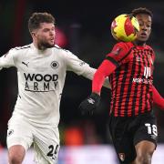 Boreham Wood’s Connor Stevens (left) with Jamal Lowe during a 1-0 win at Bournemouth in 2022 (Adam Davy/PA)