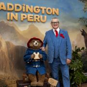 Hugh Bonneville with Paddington at the world premiere of Paddington In Peru (Ben Whitley/PA)