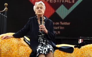 Dame Angela Lansbury speaking in Chrisp Street Market, Poplar, in April 2014, as part of the Angela Lansbury Film Festival