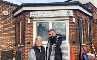 Rochelle Croom and Ali Enguzekli standing outside Mill House Social Club