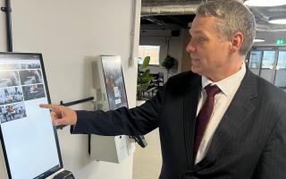 Cllr Darren Rodwell tests touch-screen technology at new sports hub