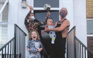 A family snapped by Hannah on the doorstep clapping for the NHS during the Covid pandemic