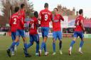 Dagenham & Redbridge players celebrate their first goal against Spennymoor Town in the FA Trophy