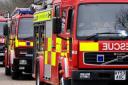 A man has been taken to hospital following a fire in Sutton Heath