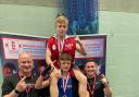 Dagenham Boxing Club's Tony Saunders hoists Billy Macey onto his shoulders after both won gold at the National Development Championships, with coaches Sean O’Sullivan and Lewis Passfield joining the celebrations