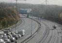 Motorcyclist fighting for life after crash with car on M25