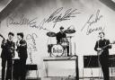 Beatles portrait by Dezo Hoffman, signed by the ‘Fab Four’ for their 1964 Australian tour promoter (RR Auction/PA)