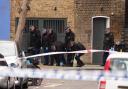 Police officers search the scene on Southern Grove in Ladbroke Grove, west London, after an eight-year-old girl was seriously injured when she was shot in an ‘appalling incident’ (Aaron Chown/PA)