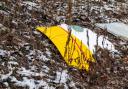 The plane skidded into a house after the crash, but no-one on the ground was hurt (AP)