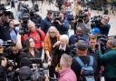 Erik and Lyle Menendez’s aunt Joan VanderMolen, centre, arrives to attend a hearing at the Van Nuys courthouse in Los Angeles (Damian Dovarganes/AP)