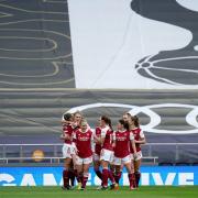 Arsenal's Vivianne Miedema (second left) celebrates scoring their second goal against Tottenham with teammates during the FA Women's Super League match at the Tottenham Hotspur Stadium