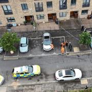 A crime scene was erected outside homes after the stabbing