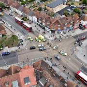 A motorbike could be seen overturned in the road after the crash