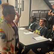 Construction company boss Natalie Sidey with students at Barking and Dagenham College